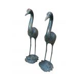 2 CAST IRON TALL CRANES