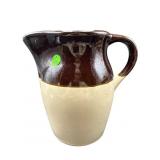 BROWN AND BEIGE STONEWARE PITCHER