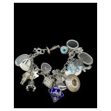 VINTAGE HEAVY STERLING SILVER CHARM BRACELET