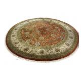 10 FT 3 IN ROUND HANDMADE RUG