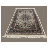 9 FT 6 IN X 6 FT 1 IN HANDMADE RUG