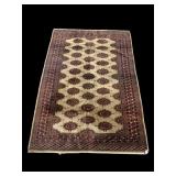 6FT X 4FT 2IN HANDMADE RUG DOES HAVE A STAIN.