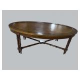 MAHOGANY OVAL LEATHER TOP COFFEE TABLE