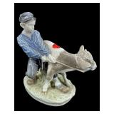 ROYAL COPENHAGEN BOY WITH COW FIGURINE