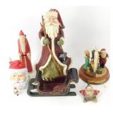 * Group of Santa Claus Statues and Dï¿½cor