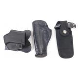 2 Pistol Holsters plus a Gerber Mini Saw -
