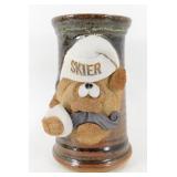 * Pottery Skier Coffee Face Cup - Chip on Side