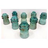 * 8 Green Glass Insulators * 8 Green Glass Insulators