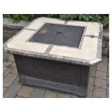 Gas Fire Pit  some of the tile has come liOose
