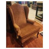 Wingback costume upholstered chair.   Look at t