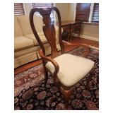Queen Anne style armchair with cabriole legs.