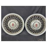 2 vintage Oldsmobile wire whell cover hubcaps
