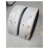 Old pair of metal boat trailer fenders.  Look at