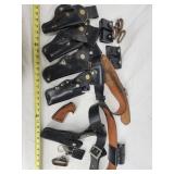 Nice assortment of leather holsters, belts, ammo