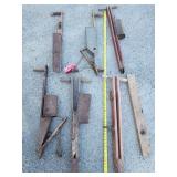 6 Antique corn planters and wood level.  As found