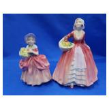 2 Royal Doulton porcelain doll figurines.