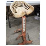 Antique Cast Iron Tractor Seat  mounted on