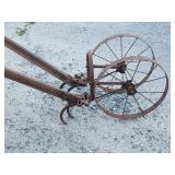 Antique hand plow by American Fork Co.  Look at