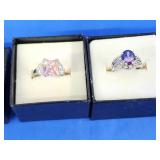 2 sterling silver rings.   Look at the photos for