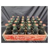 Coca-Cola wood crate with 24 bottles.  6.5 OZ.