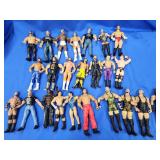 24 Action figure toys. WWE.  5 apprx 8" and 19