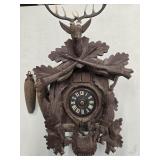 Cuckoo Clock , German , wild game carvings  , has