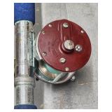 Penn Peer fishing reel no 209 on Woolworth rod.
