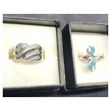 2 Sterling silver rings.  Wave swirl band and