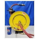 Retractable air hose reel.   Look at the photos