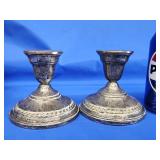 Pair sterling silver candlesticks.   Weighted by