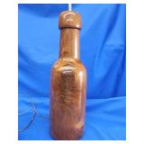 Solid turn wood lamp.  Has knot on front. Lamp