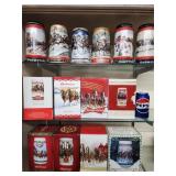 14 Budweiser Christmas beer Steins.   Look at the