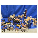 35 Hirse Figures and 4 dogs look at pictures for