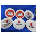 6 plastic beer trays. 2 Budweiser and 4 Michelob.