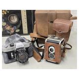 Vintage Camera's Canon and a box camera Look at