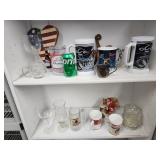 Glasses, mugs, Christmas figurine, and more.
