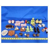 16 pair of novelty salt and pepper shakers.