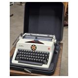 Olympia Portable Typewriter look at pictures for