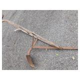 Antique push plow as found and extra plow blade