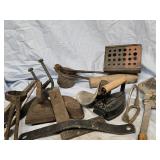 Old Tools - blacksmith tongs , sadirons , brass