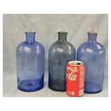 3 Apothecary Bottles with glass stoppers look at
