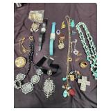 Lot of costume jewelry.   Necklaces. Watches,