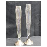 2 sterling base bud vases.  Both are weighted.
