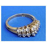14K gold ring with double row stair case of gem