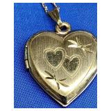 Vintage 14K gold heart locket.  Look at the