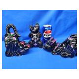Wood black laqucared hand decorated cats.  Made