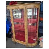 Oak Ctystal Cabinet has Bow glass sides , flat
