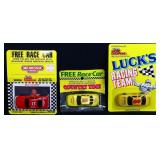 Lot of 3 toy race cars in org packages