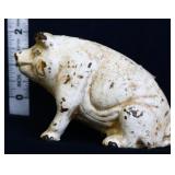 Vintage white cast iron sitting pig bank