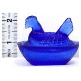 MIniature cobalt hen on nest